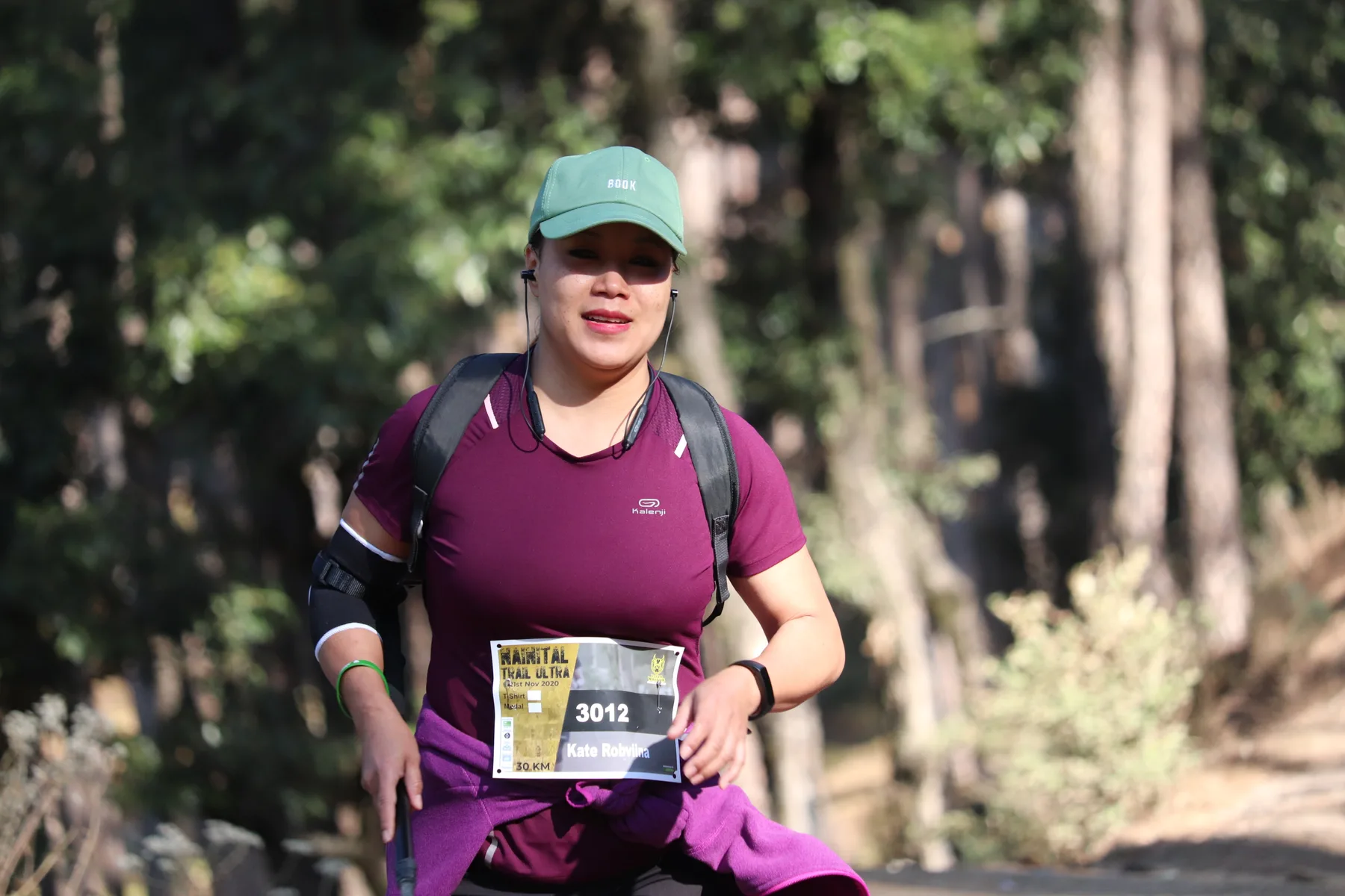 Nainital Trail Ultra archive: Runner on a sunlit Nainital forest trail